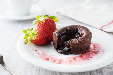 Chocolate souffle with strawberries - 137850275