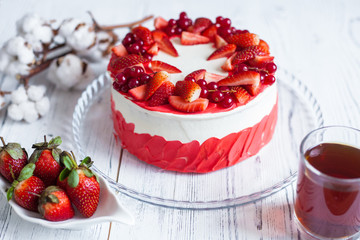 White-red sponge cake with fresh berries