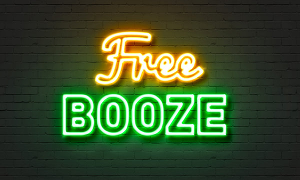 Free Booze Neon Sign On Brick Wall Background.