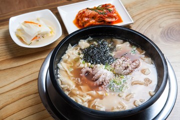 nakji sujebi. Hand-pulled Dough Soup with small octopus.