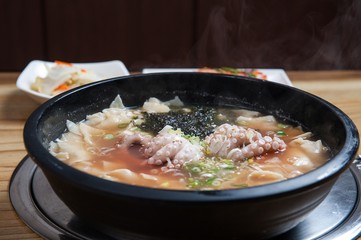 nakji sujebi. Hand-pulled Dough Soup with small octopus.