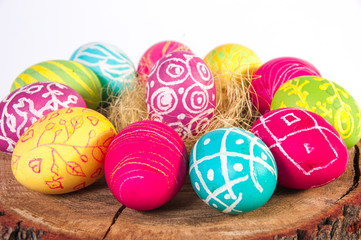 Closeup of beautiful Easter eggs with their hands. A festive mood. 

