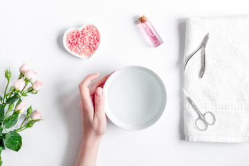 salt and cream for nail care in spa top view