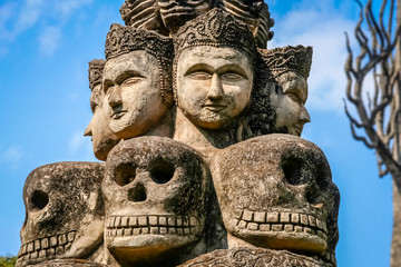 Fototapeta na wymiar Skulls sculptures in Buddha Park