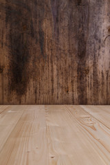 Old rustic wood background. Wooden board template for design. Rough dark plywood texture. Grungy pattern.