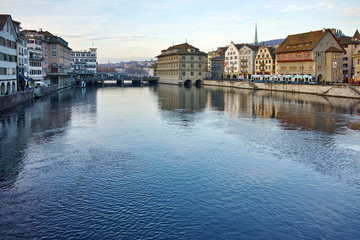 Fototapeta na wymiar Reflection of City of Zurich in Limmat River, Switzerland
