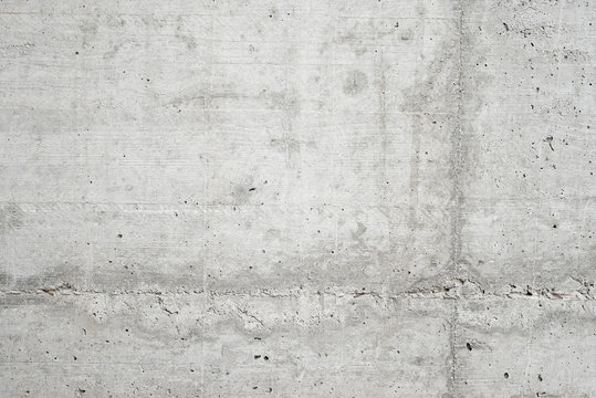 Abstract empty background.Photo of blank natural concrete wall texture. Grey washed cement surface.Horizontal.