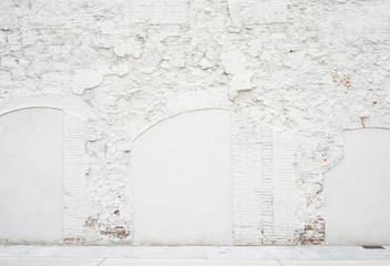 Abstract vintage empty background.Photo of grungy white painted brick wall texture. White washed brickwall surface.Horizontal mockup. Front side view.