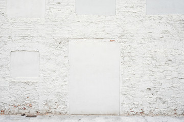 Abstract vintage empty background.Photo of old white painted brick wall texture. White washed...