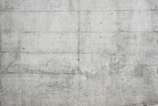 Abstract grungy empty background.Photo of gray natural concrete wall texture. Grey washed cement surface.Horizontal.