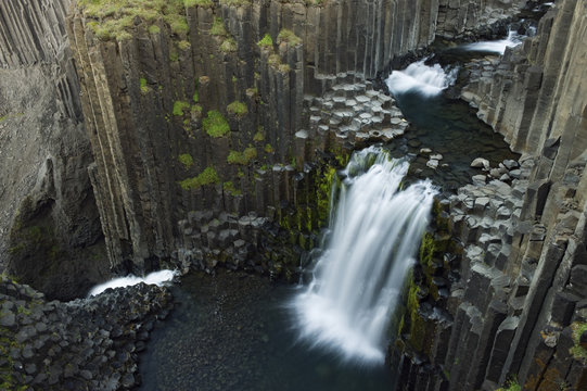 Litlanesfoss waterfall, Hengifoss&aacute; river, Basalt lava solidified in hexagonal columns, Iceland, August 2008 - EMBARGOED UNTIL AUGUST 2012