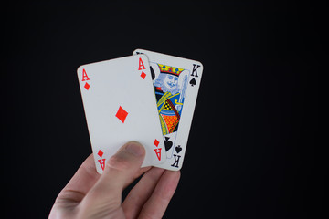 Black Jack als Kartenpaar auf der Hand Ass und König