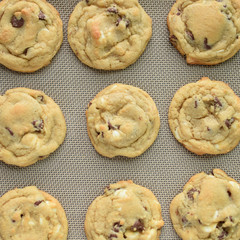 perfect fresh baked milk chocolate chip cookies on the cookie sheet