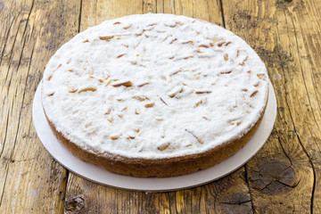Cream cake with pine nuts