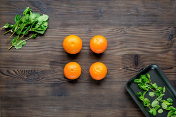 Breakfast with orange on wooden background top view mock-up