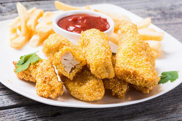 chicken strips and French fries