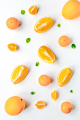 fresh orange fruit on white background top view pattern