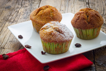 Muffins on a wooden table