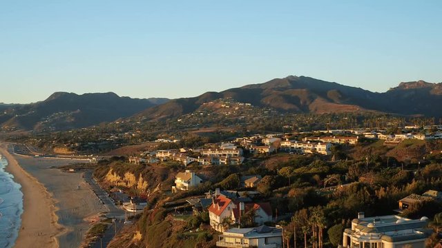 Malibu Aerial Point Dume Homes v18 Flying low over coastal homes and beach panning.