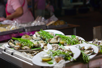 Fresh oysters in a white plate