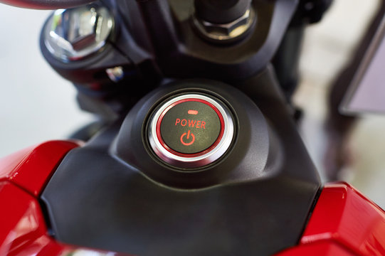 Fototapeta Button POWER on the dashboard of electric motorcycle
