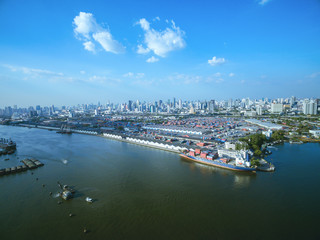 Naklejka premium Aerial view container and cargo ship, import export, business logistic supply chain transportation concept and crane at international Port for shipping cargo top view background
