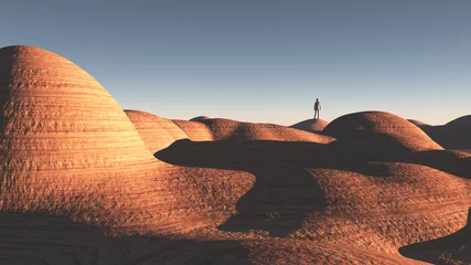 Foto auf Acrylglas Man stands in rock desert © rolffimages