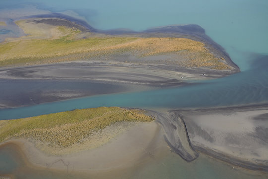 Aerial view over Lake Laitaure showing silt deposits from the Rapa river forming sand spits and vegetational growth, Sarek National Park, Laponia World Heritage Site, Lapland, Sweden, September 2008