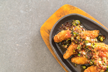 fried fish stick with spicy sauce