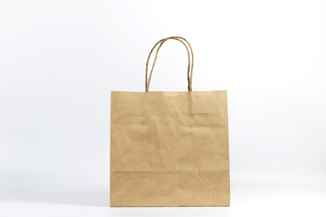 Paper shopping bag on white background