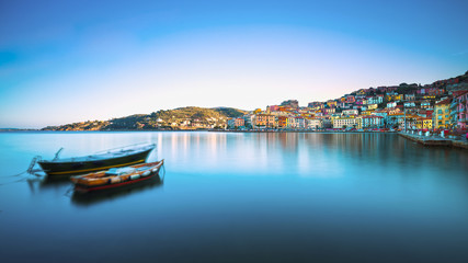 Wooden small boats in Porto Santo Stefano seafront. Argentario, Tuscany, Italy