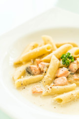 Penne carbonara pasta with salmon