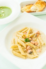Penne carbonara pasta with salmon