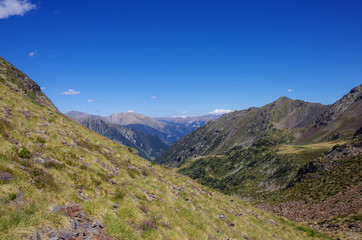 Panorama of the Pyrenees mountains in Andorra, from top of Coma Pedrosa peak.