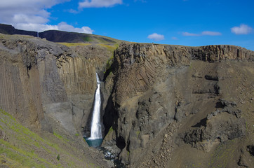 Hengifoss is the second highest waterfall on Iceland. The most special thing about the waterfall are multicolored layers in the basalt rock behind waterfall.