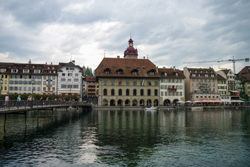 Luzerne, Switzerland - August 23, 2010: Traditional house on embankment of Reuss River in old town of Lucerne ( Luzerne )