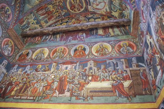 Frescoes inside church in monastery Voronet. One of Romania's painted Orthodox monasteries in southern Bucovina,region Suceava, Romania