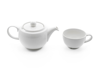 white tea pot with tea cup