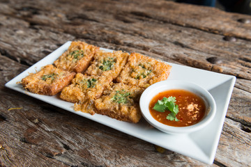 Fried bread with minced pork spread