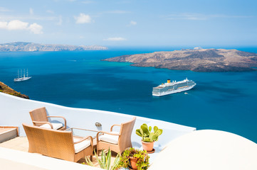 Fototapeta na wymiar Beautiful terrace with sea view. Santorini island, Greece.