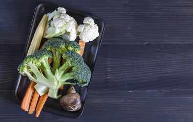 Fresh vegetables on the wooden background. Vegetables for health.