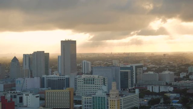 Miami Aerial v22 Flying low over downtown panning with cityscape views at sunset.