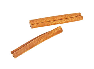 Cinnamon sticks on white background, top view
