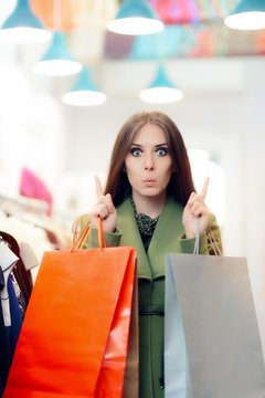 Surprised Shopping Woman Wearing a Green Coat in Fashion Store