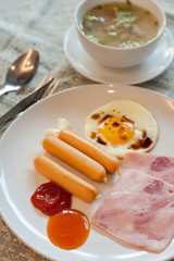 English breakfast - fried egg bacon and toast.