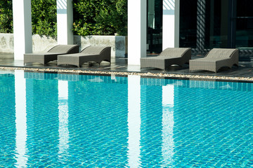 sun-bed near a swimming pool