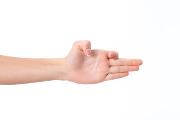 female hand outstretched sideways with straight fingers and thumb  forefinger bent isolated on white background