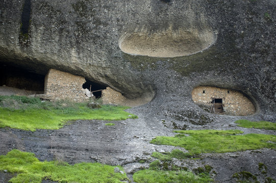 Cave dwellings of hermit monk in Meteora cliffs, Meteora, Greece, October 2008