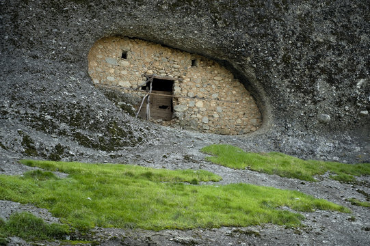 Cave dwelling of hermit monk in Meteora cliffs, Meteora, Greece, October 2008