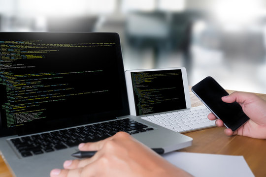 "Developer Team Working Laptop Computer Mobile Application Softwareand Web Design Online Technology Content , Web script , laptop display."